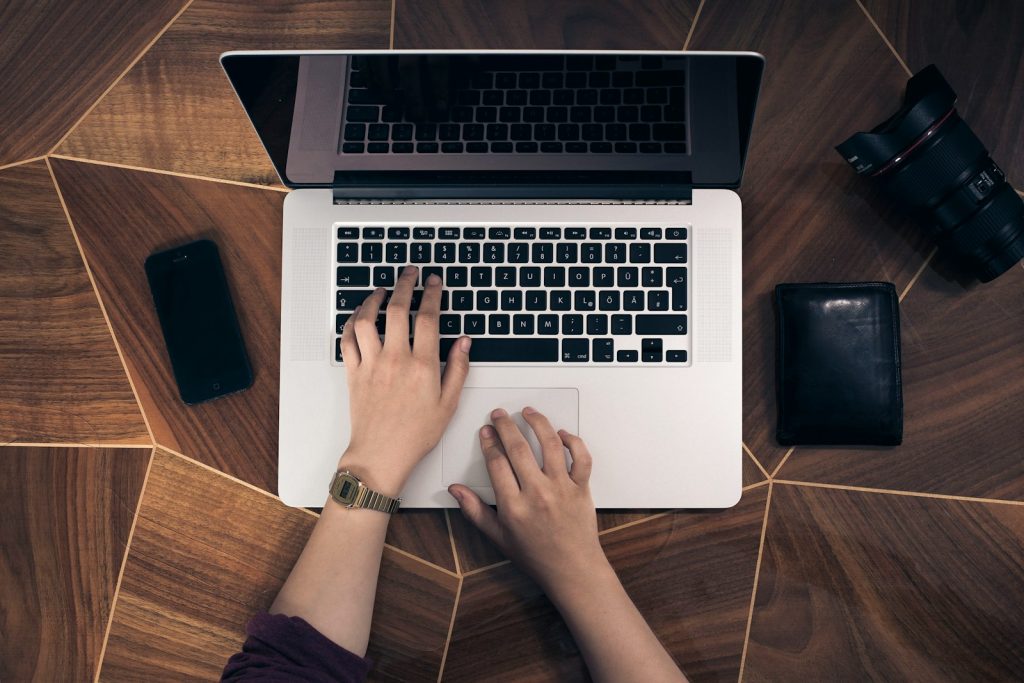 person using MacBook Pro, patpat360 Overview